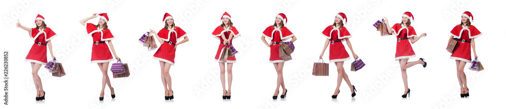 Young woman in red santa costume on white Young woman in red santa costume on white
