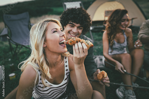 Couple Enjoy Barbecue In Nature photo