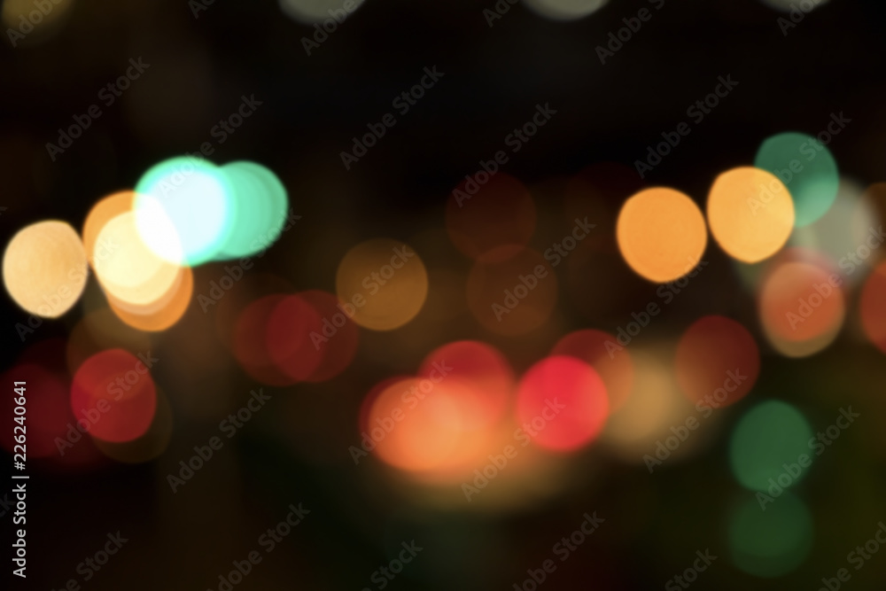 Blurry background image of defocused colorful lights at night Blurry background image of defocused colorful lights at night