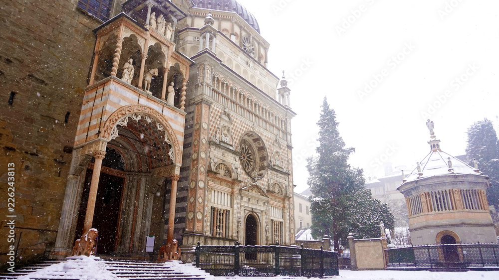 Cappella Colleoni chapel in Piazza Duomo square with snow, Bergamo, Italy