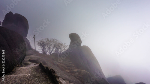 Top of the yellow mountains in the fog. Huangshan National Park in China