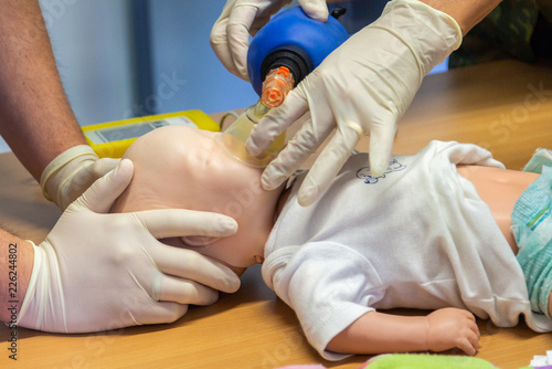 Medical exercise with equipment on a child puppet