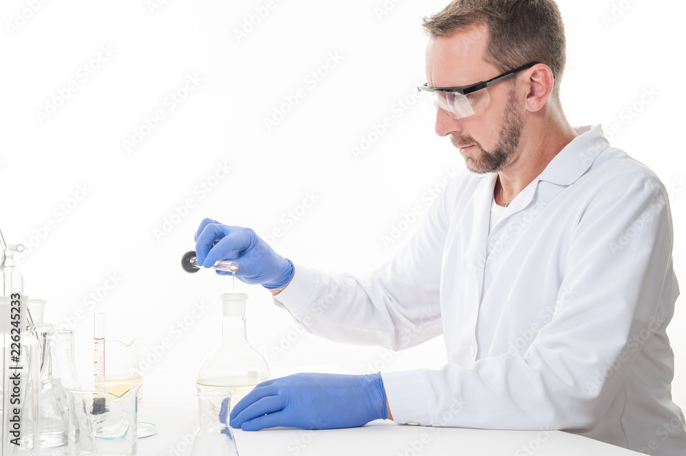 man in the laboratory
view of a man in the laboratory while performing experiments
man in the laboratory
view of a man in the laboratory while performing experiments