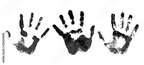 Hand in the black blood. Bloody handprint on white background