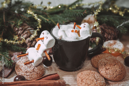 christmas happy marshmallow man in a cup of coffee
