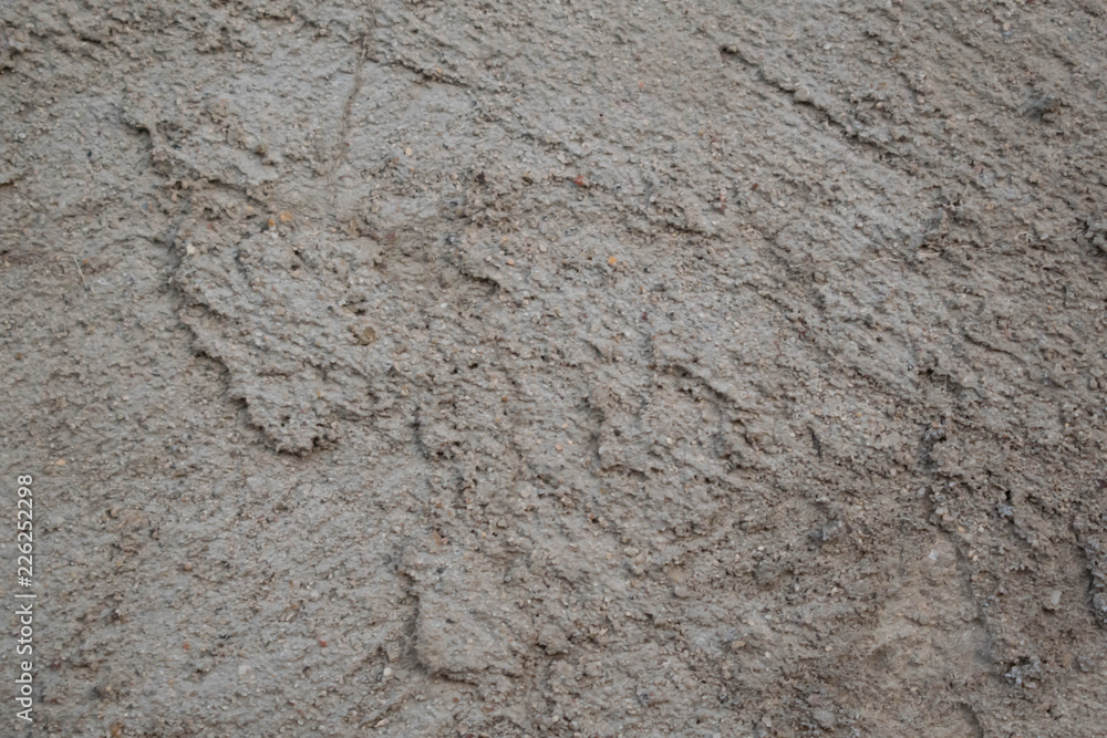 wall of concrete stony putty with irregularities for the design background wall of concrete stony putty with irregularities for the design background