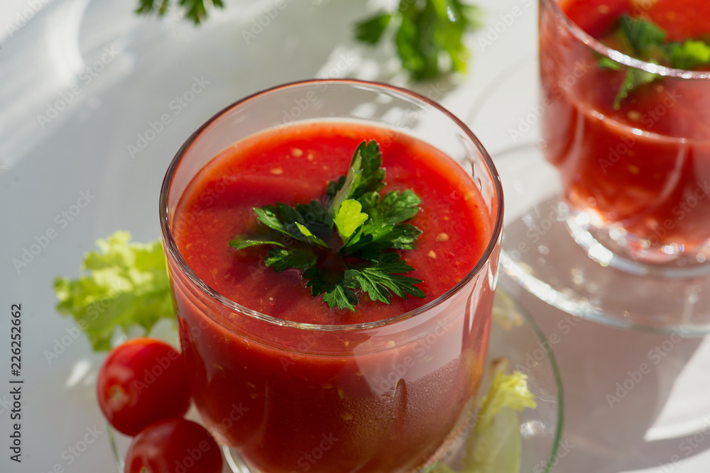 Fresh tomato juice with tomatoes and greens. Fresh tomato juice with tomatoes and greens.