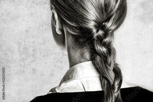 Back view at businesswomen with tail. Image in black and white style