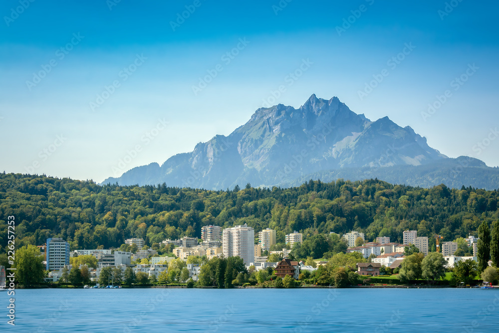 Panoramic view of the Mount Pilatus in Luzern, Switzerland from the boat on Lake of Luzern in a summer day.