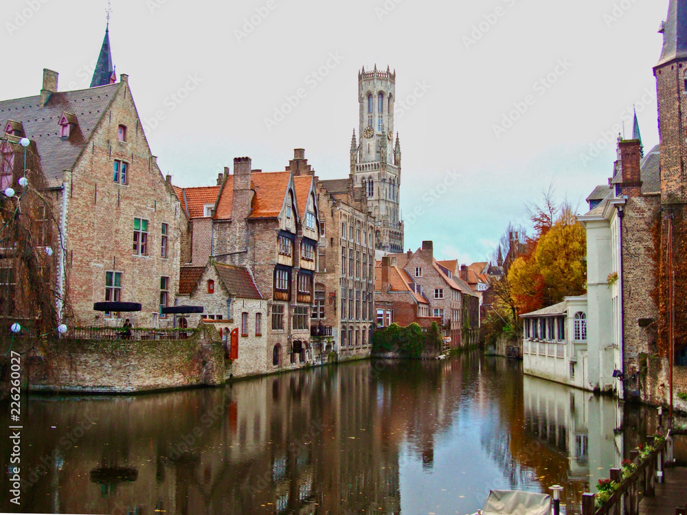 Brugge/Belgium - Autumn. Old town buildings on the canal. Beautiful reflection