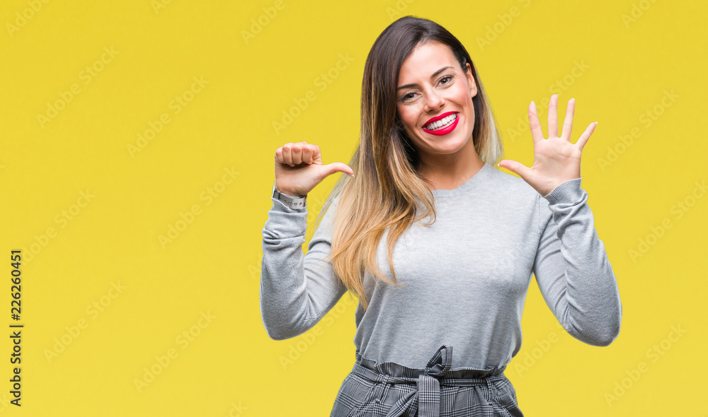 Fototapeta premium Young beautiful worker business woman over isolated background showing and pointing up with fingers number six while smiling confident and happy.