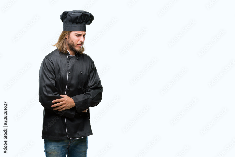 Young handsome cook man with long hair over isolated background with hand on stomach because nausea, painful disease feeling unwell. Ache concept. Young handsome cook man with long hair over isolated background with hand on stomach because nausea, painful disease feeling unwell. Ache concept.