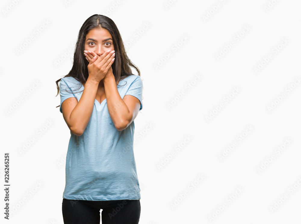 Young beautiful arab woman over isolated background shocked covering mouth with hands for mistake. Secret concept. Young beautiful arab woman over isolated background shocked covering mouth with hands for mistake. Secret concept.