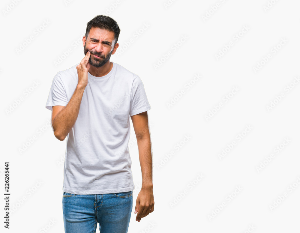 Adult hispanic man over isolated background touching mouth with hand with painful expression because of toothache or dental illness on teeth. Dentist concept. Adult hispanic man over isolated background touching mouth with hand with painful expression because of toothache or dental illness on teeth. Dentist concept.