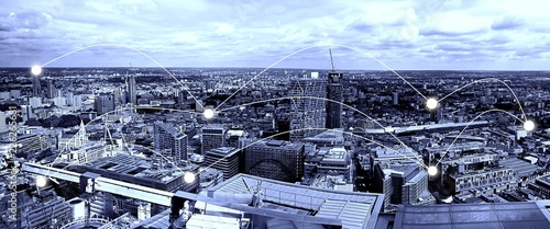 Obraz na plátne Blue tone London cityscape and network connection and communication concept