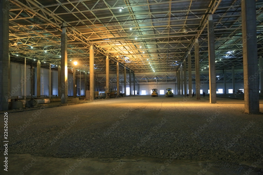 The process of construction and launch of a large logistics center, its internal filling and finishing, the process of formation of the external territory and arrangement of warehouse and office space The process of construction and launch of a large logistics center, its internal filling and finishing, the process of formation of the external territory and arrangement of warehouse and office space