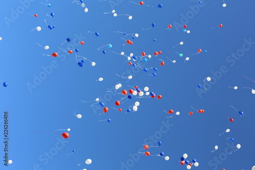 Multi-colored balloons that are released in free flight