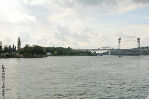 Embankment of the don river before the rain  heavy clouds come from the East. quay of the river the storm the people