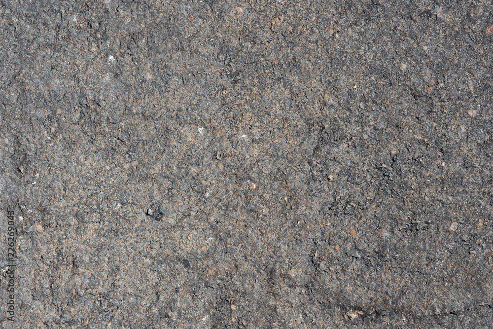 Gray rough volcanic stone surface. Detailed natural background or texture Gray rough volcanic stone surface. Detailed natural background or texture