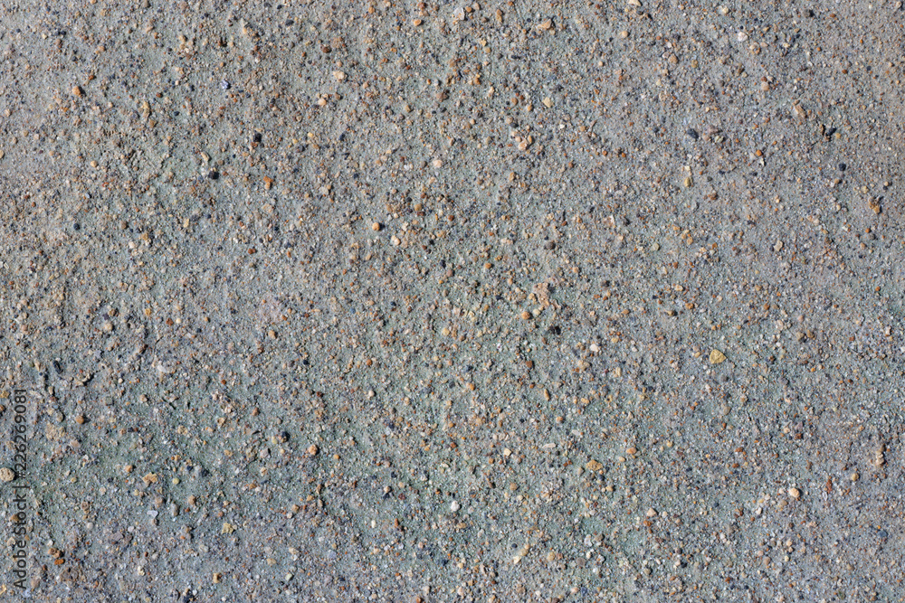 Gray volcanic sand, small stone surface. Detailed natural background or texture Gray volcanic sand, small stone surface. Detailed natural background or texture