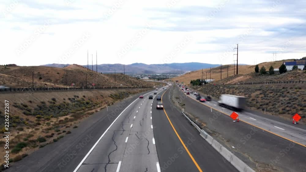 Freeway fast moving cars at rush hour in the desert Freeway fast moving cars at rush hour in the desert