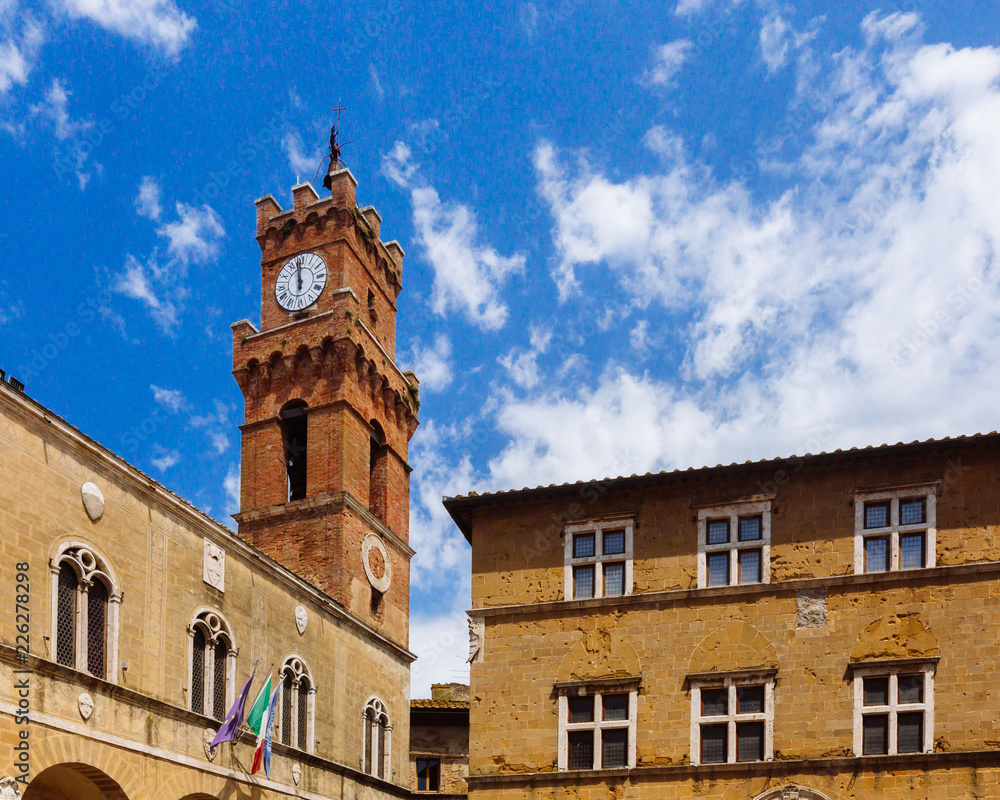 Clock tower and architecture in Pienza, Italy