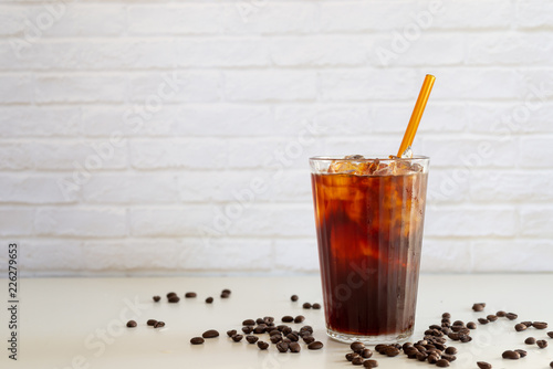 Canvas Print a glass of homemade cold cold brew coffee on white table