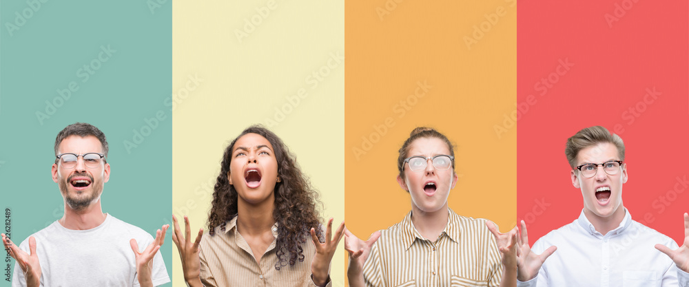 Collage of a group of people isolated over colorful background crazy and mad shouting and yelling with aggressive expression and arms raised. Frustration concept.