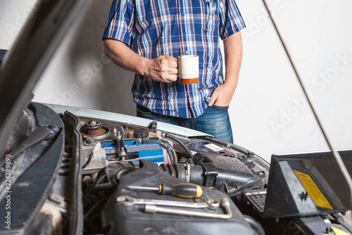 Auto mechanic with a wrench.