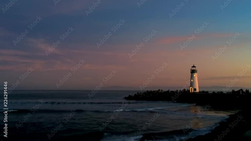 The Pacific Ocean at the Santa Cruz Breakwater (aka Walton) Lighthouse at sunset, in Santa Cruz, California, USA, circa April 2017 The Pacific Ocean at the Santa Cruz Breakwater (aka Walton) Lighthouse at sunset, in Santa Cruz, California, USA, circa April 2017