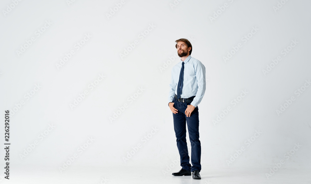 man in shirt with tie on bright background man in shirt with tie on bright background