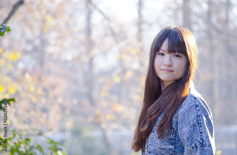 Japanese Girl poses on the street in Kichijoji, Japan. Kichijoji is a Tokyo's No.1 city people want to live. Japanese Girl poses on the street in Kichijoji, Japan. Kichijoji is a Tokyo's No.1 city people want to live.