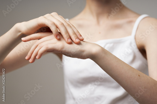 woman stretches her hand palm