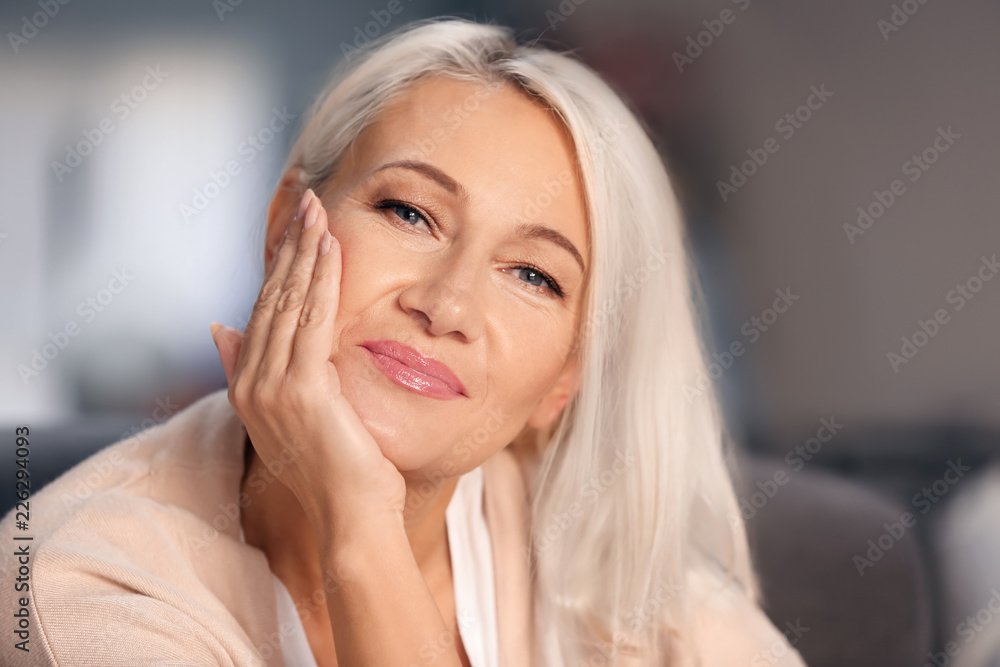 Portrait of smiling mature woman at home Portrait of smiling mature woman at home