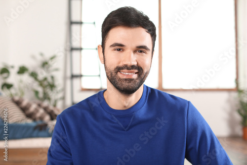 Young bearded man in casual...