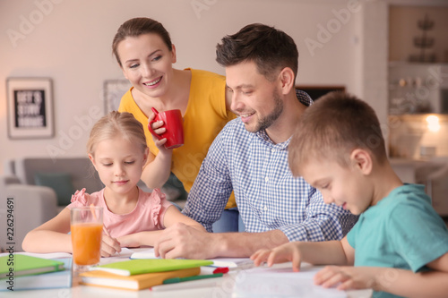 Little children with parent...