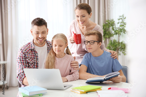 Children with parents doing...