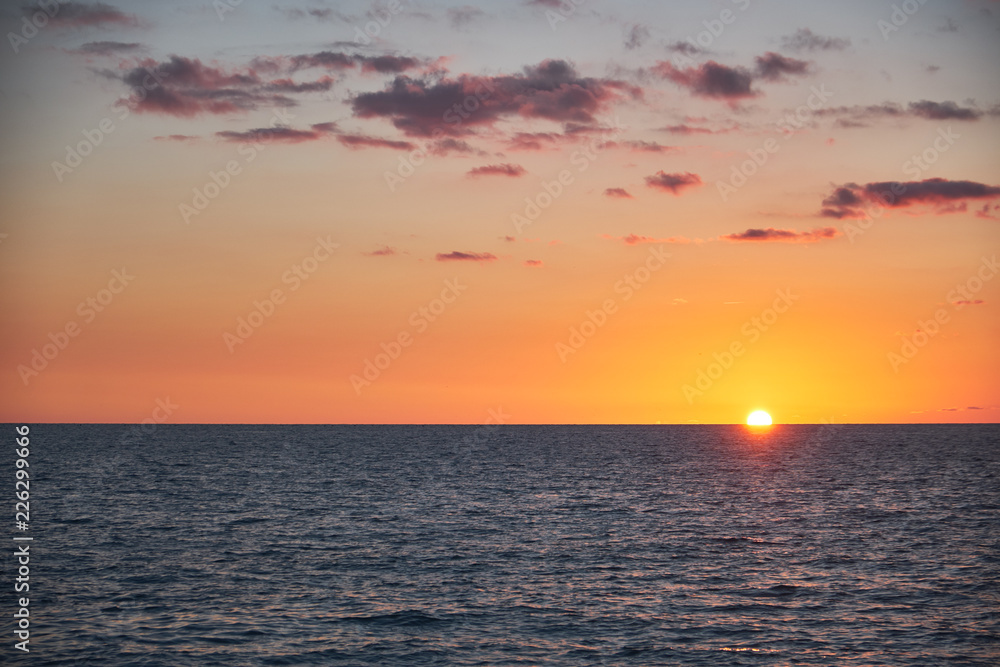 Idyllic landscape with sunset over the sea. Outdoor recreation. Non-urban scene. Travel destination. Idyllic landscape with sunset over the sea. Outdoor recreation. Non-urban scene. Travel destination.