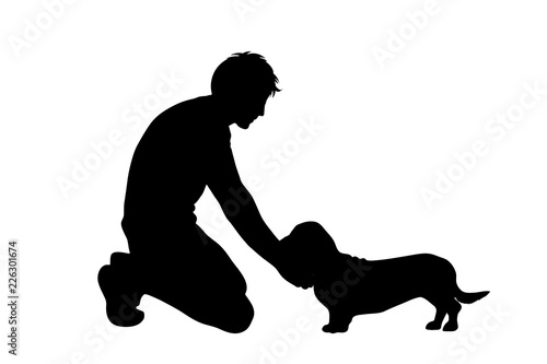 Vector silhouette of man with dog white background.