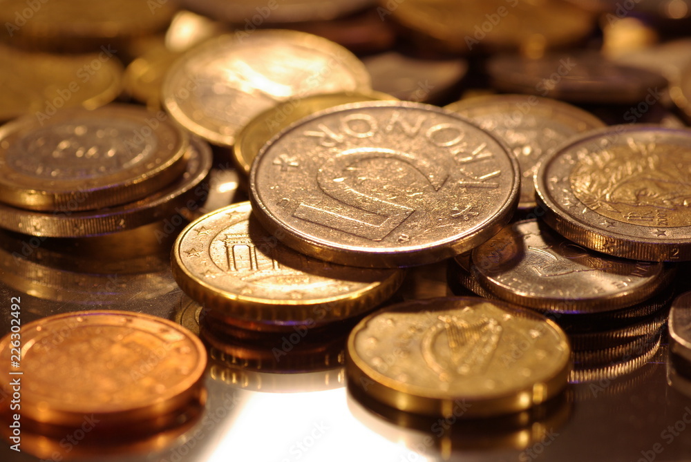 photo of metal coins of different currencies photo of metal coins of different currencies