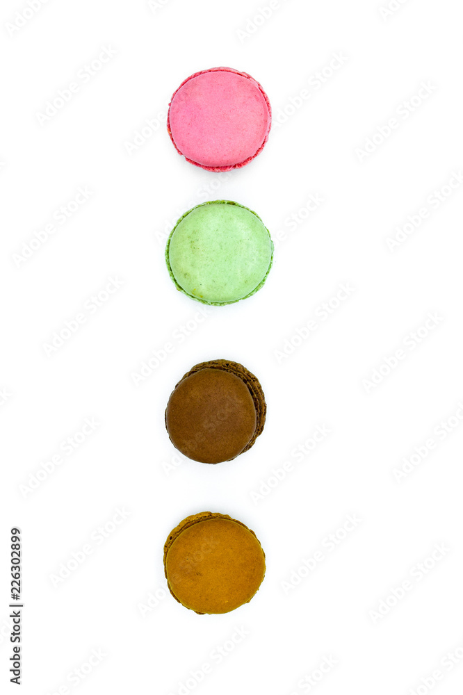 macarons isolated on white background, sweet colorful macarons in row macarons isolated on white background, sweet colorful macarons in row