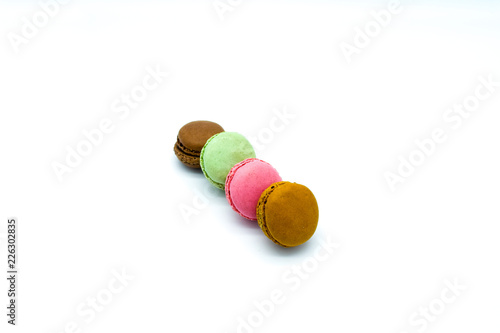 macarons isolated on white background, sweet colorful macarons in row