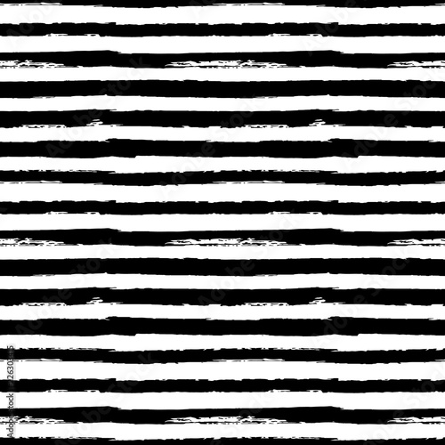 Black and white seamless pattern background with grunge paint stripes vector photo