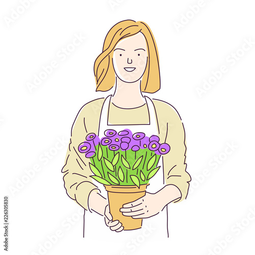 Florist girl with a pot of beautiful flowers