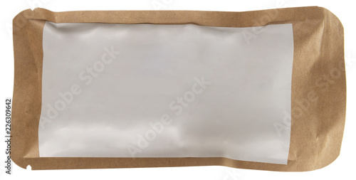 Sealed craft paper food, coffee, tea pack whth blank white sticker isolated on white photo