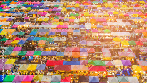 Photography Aerial view multiple colour market roof top, flea market