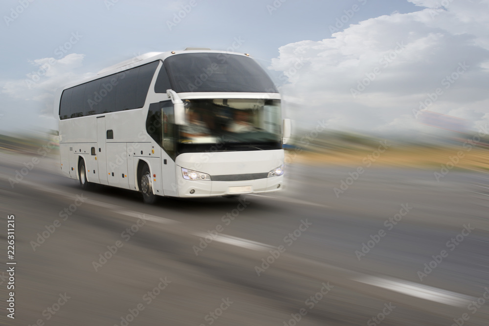 Blurred image of a moving bus Blurred image of a moving bus