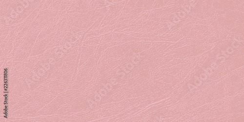 Pale pink skin texture, natural or faux leather background. photo