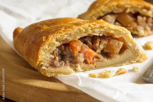 Welsh Oggie a regional delicacy from Wales of lamb leeks and vegetables baked in a short crust pastry case similar to a Cornish pasty