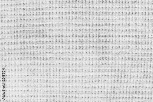 Linen texture background. Surface of white textile fabric.